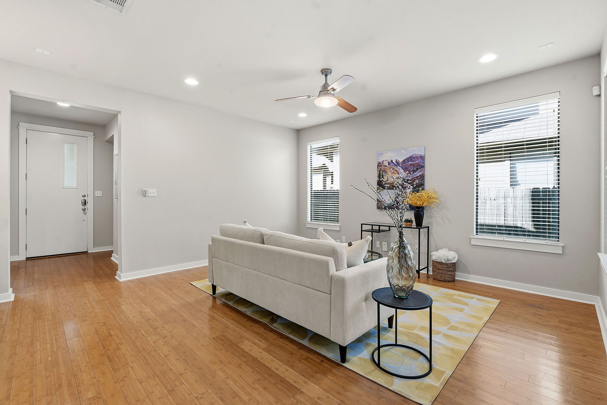 2911 Corbin Lane Austin, TX 78704 - Photo 33 of 37 a living room with furniture and a wooden floor