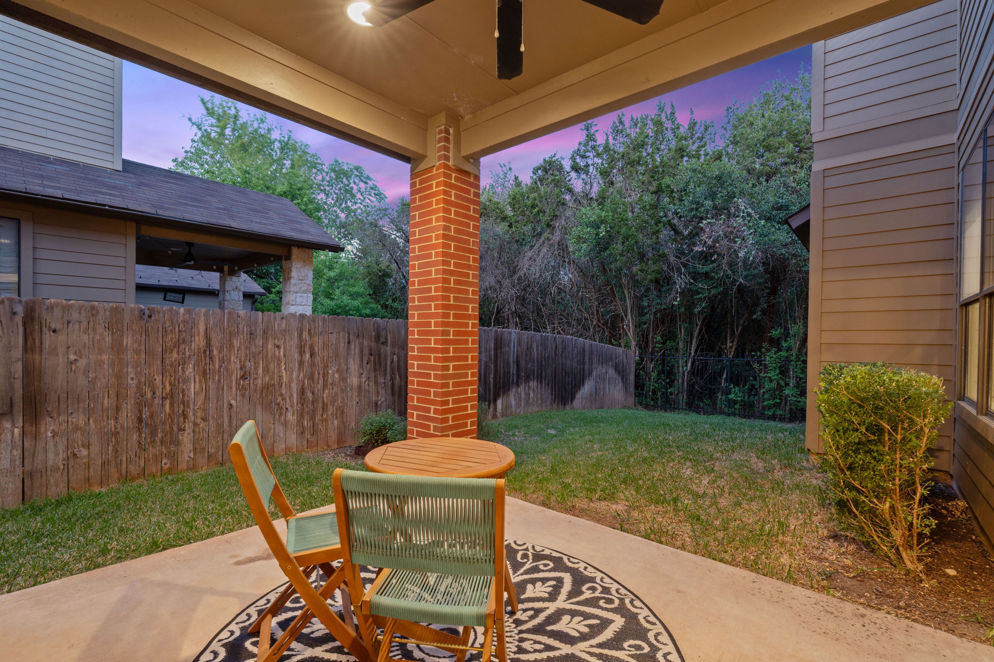 2911 Corbin Lane Austin, TX 78704 - Photo 34 of 37 a backyard of a house with table and chairs