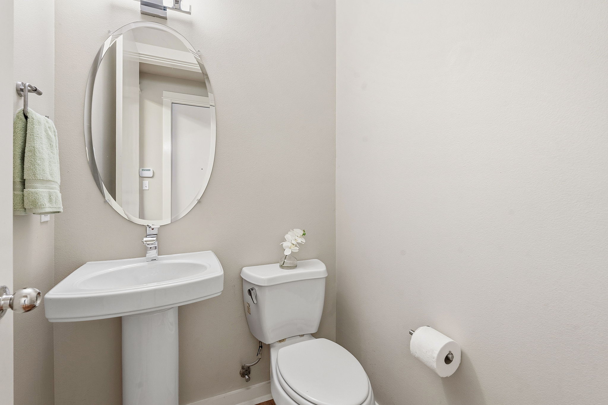 2911 Corbin Lane Austin, TX 78704 - Photo 10 of 37 a bathroom with a toilet sink and mirror