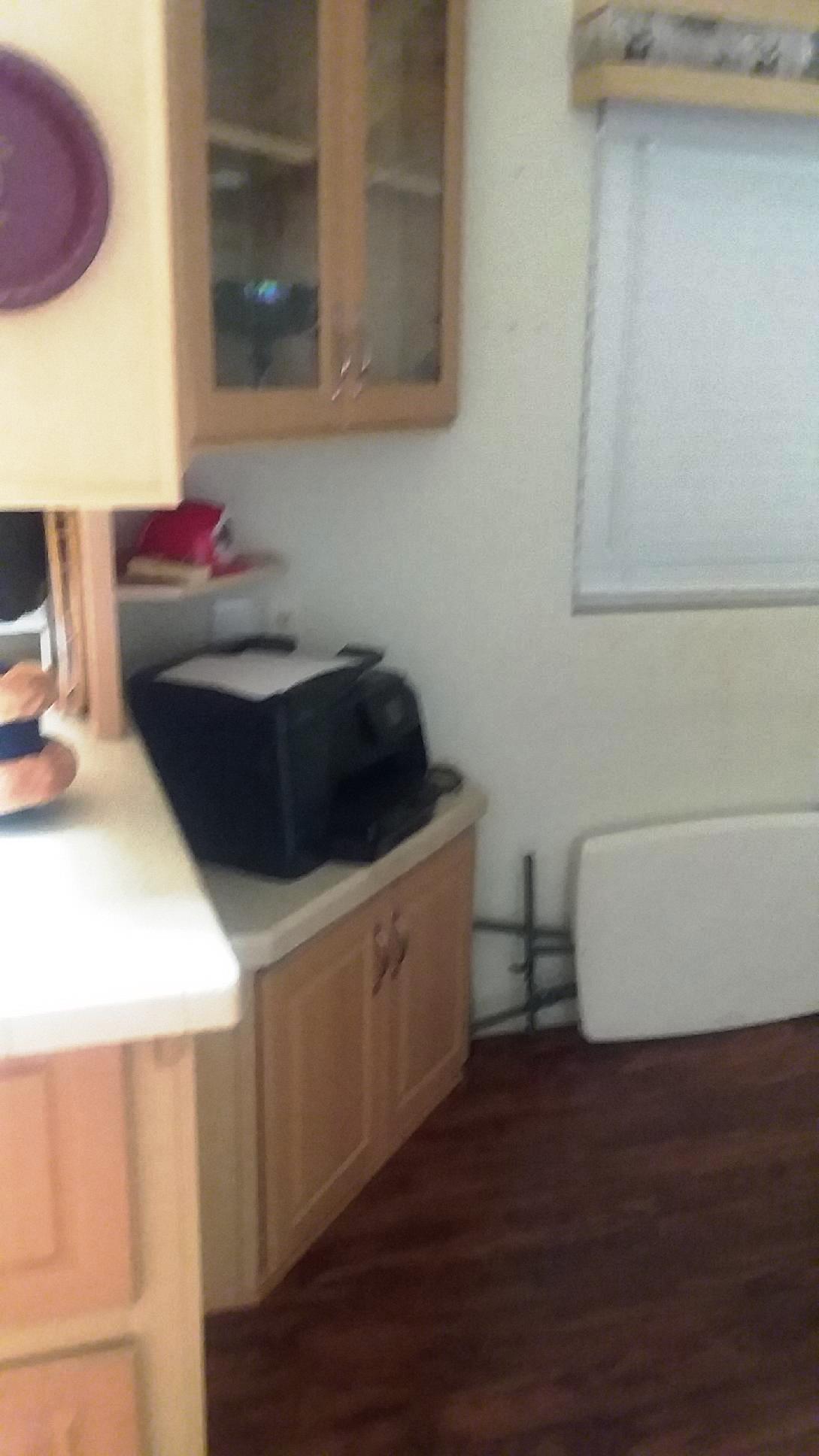 84136 Ave 44, Unit 593 Indio, CA 92203 - Photo 11 of 31 a kitchen with a sink and a stove