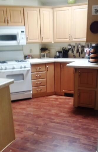 84136 Ave 44, Unit 593 Indio, CA 92203 - Photo 15 of 31 a kitchen with a sink cabinets and window