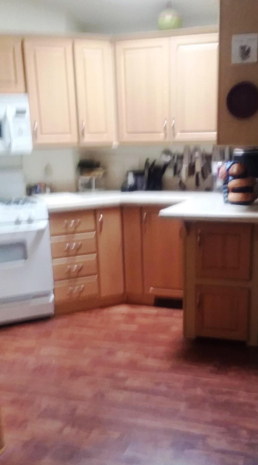 84136 Ave 44, Unit 593 Indio, CA 92203 - Photo 16 of 31 a kitchen with stainless steel appliances granite countertop a sink and a stove
