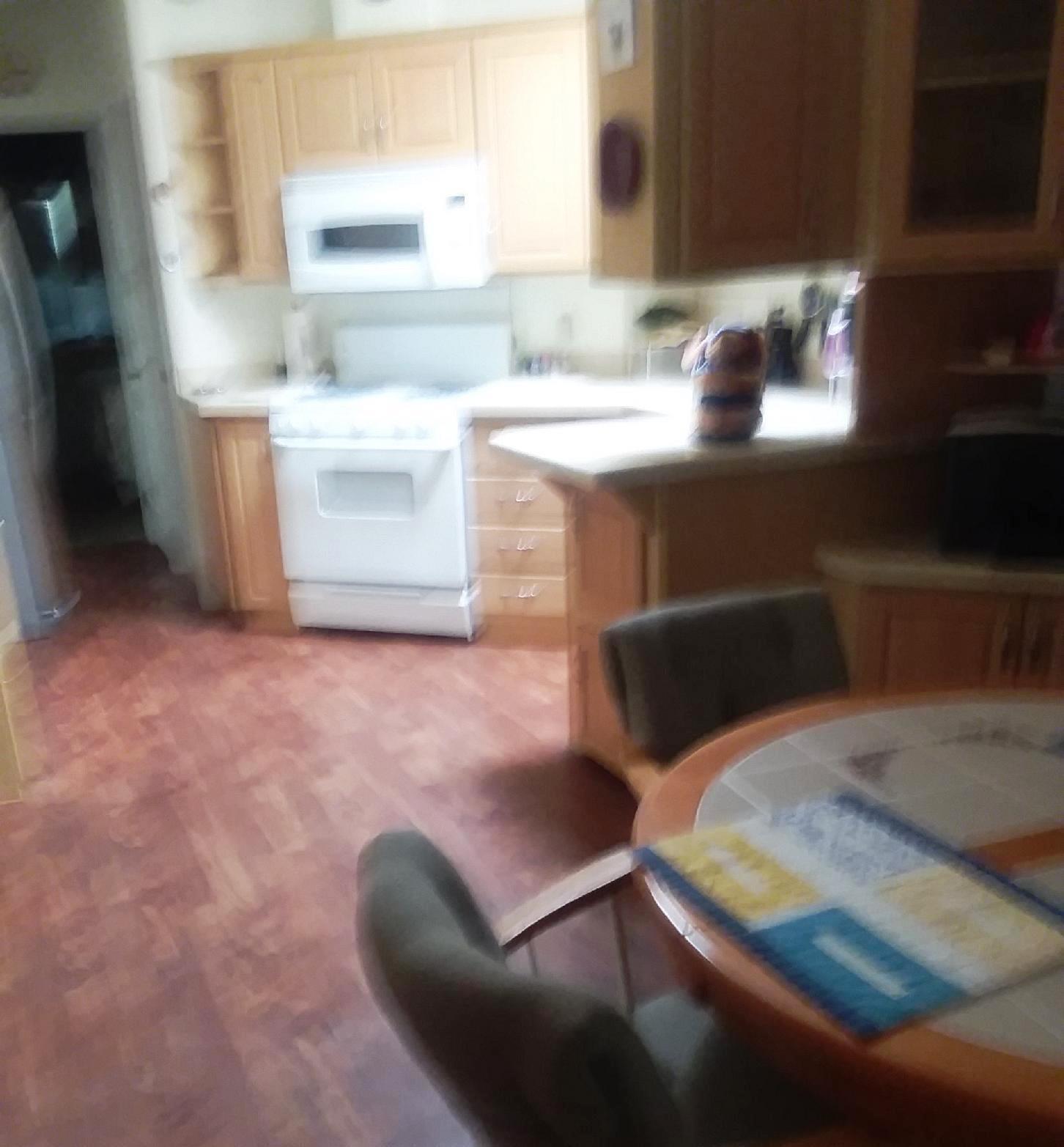 84136 Ave 44, Unit 593 Indio, CA 92203 - Photo 17 of 31 a kitchen with a stove and a refrigerator
