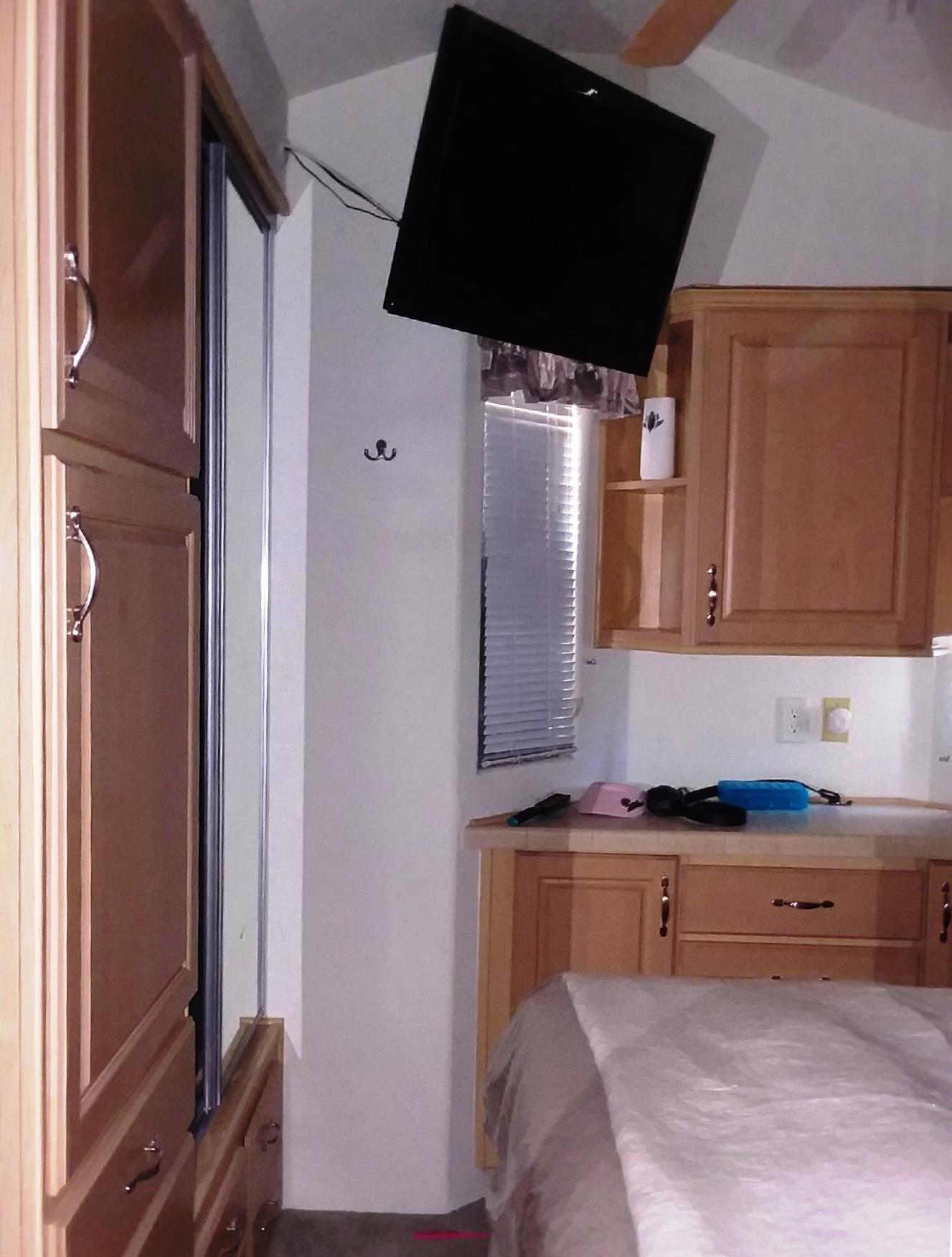 84136 Ave 44, Unit 593 Indio, CA 92203 - Photo 19 of 31 a kitchen with a sink and a refrigerator
