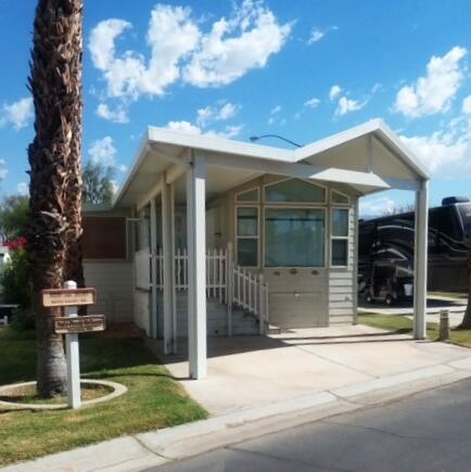 84136 Ave 44, Unit 593 Indio, CA 92203 - Photo 2 of 31 a view of a building with a garden