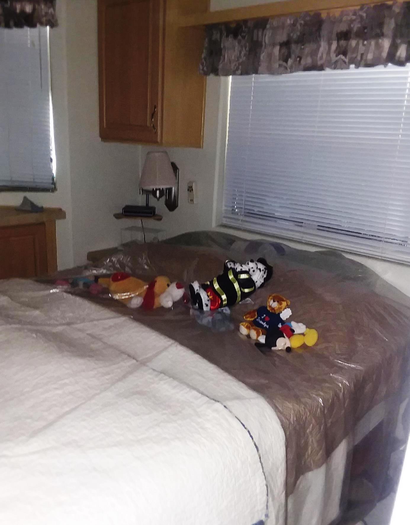 84136 Ave 44, Unit 593 Indio, CA 92203 - Photo 21 of 31 a bed room with a bed and a couch