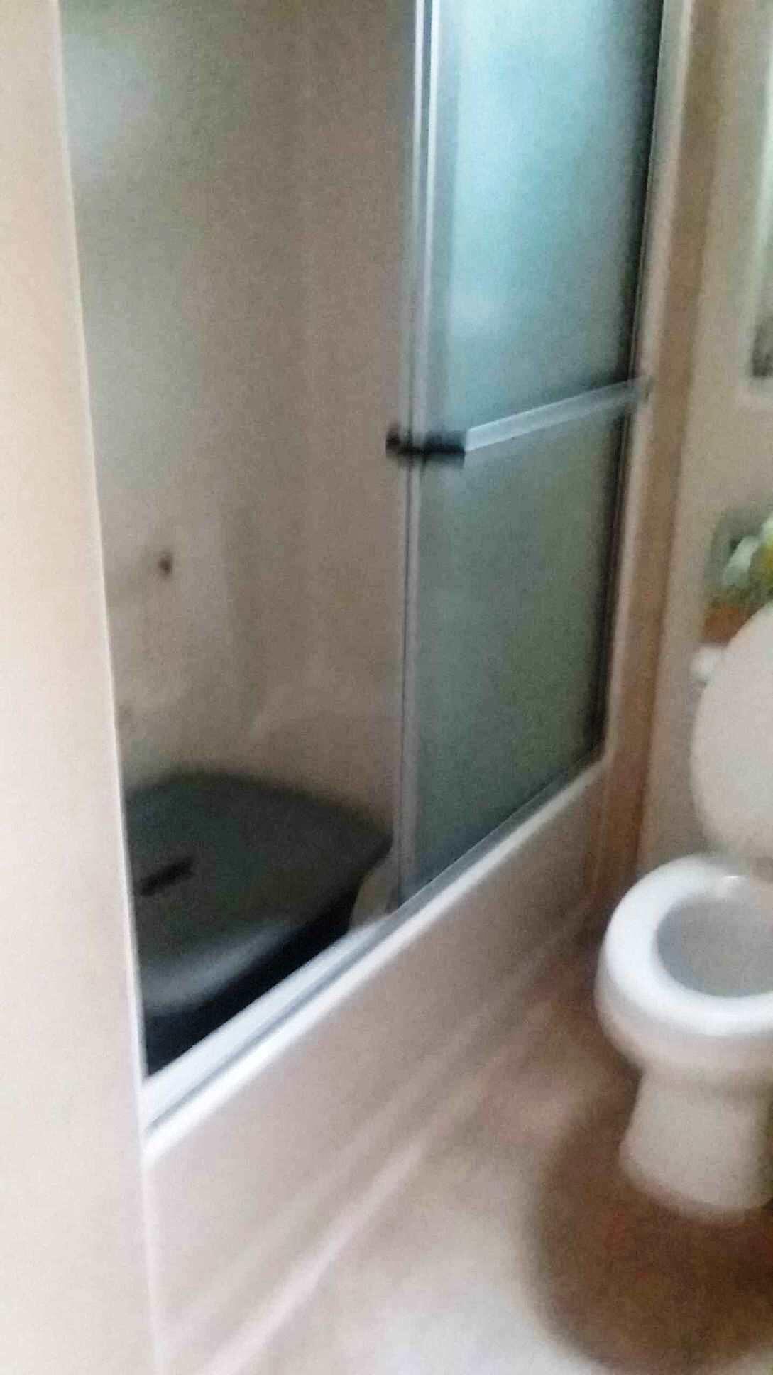 84136 Ave 44, Unit 593 Indio, CA 92203 - Photo 28 of 31 a bathroom with a toilet and a shower