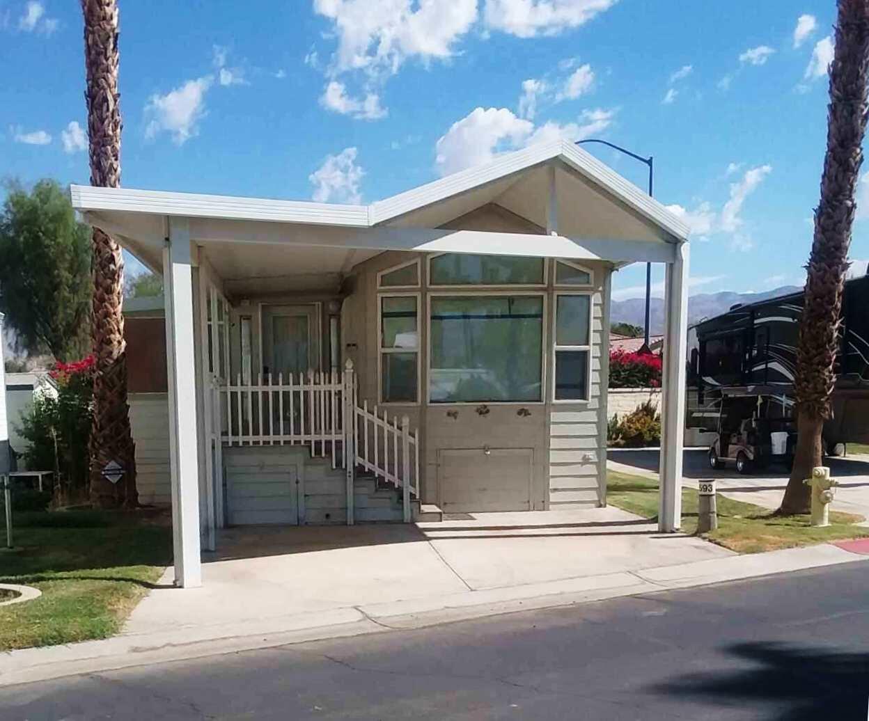 84136 Ave 44, Unit 593 Indio, CA 92203 - Photo 3 of 31 a view of a house with a porch