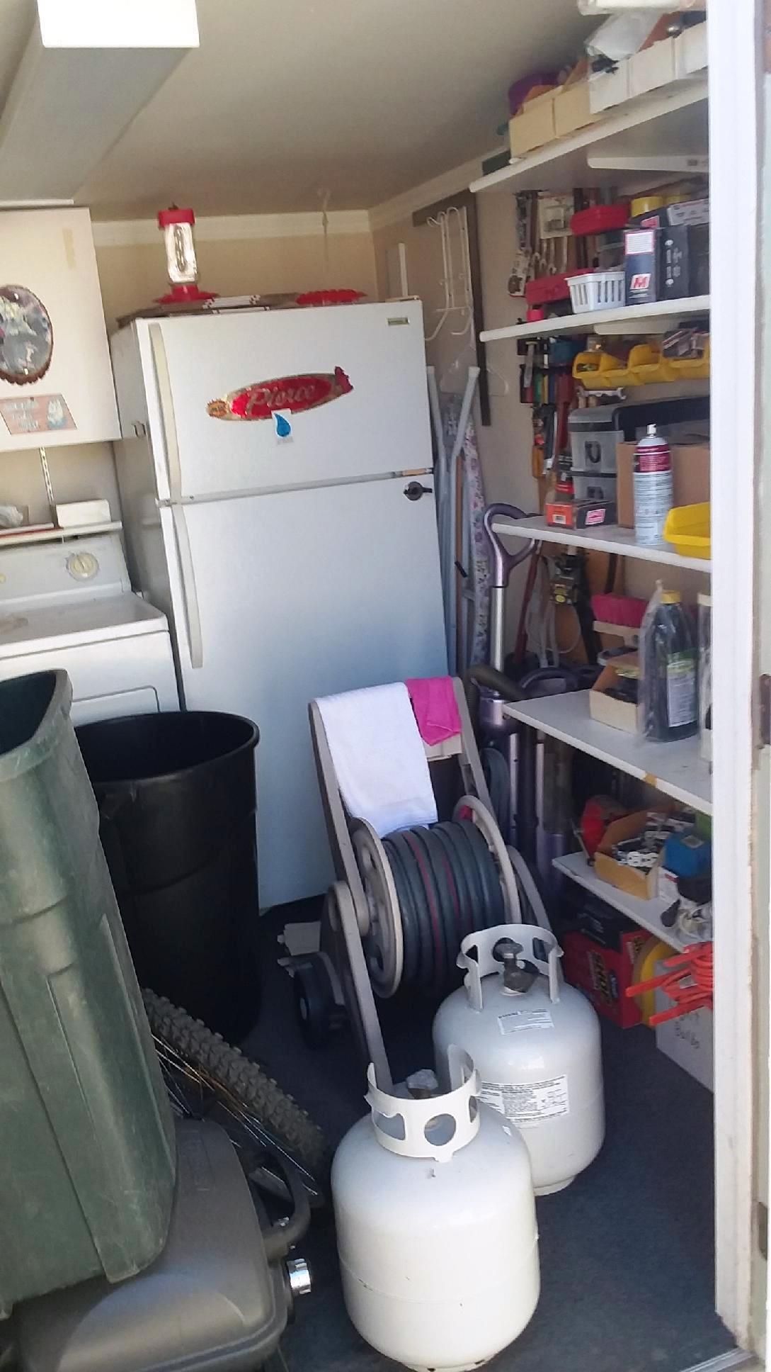 84136 Ave 44, Unit 593 Indio, CA 92203 - Photo 31 of 31 a utility room with a refrigerator and washer