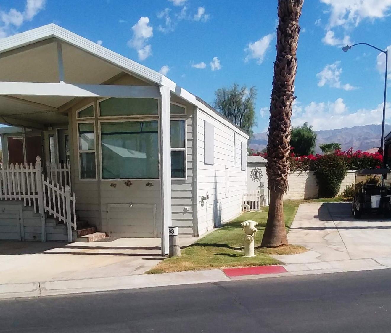 84136 Ave 44, Unit 593 Indio, CA 92203 - Photo 4 of 31 a view of a house with a street
