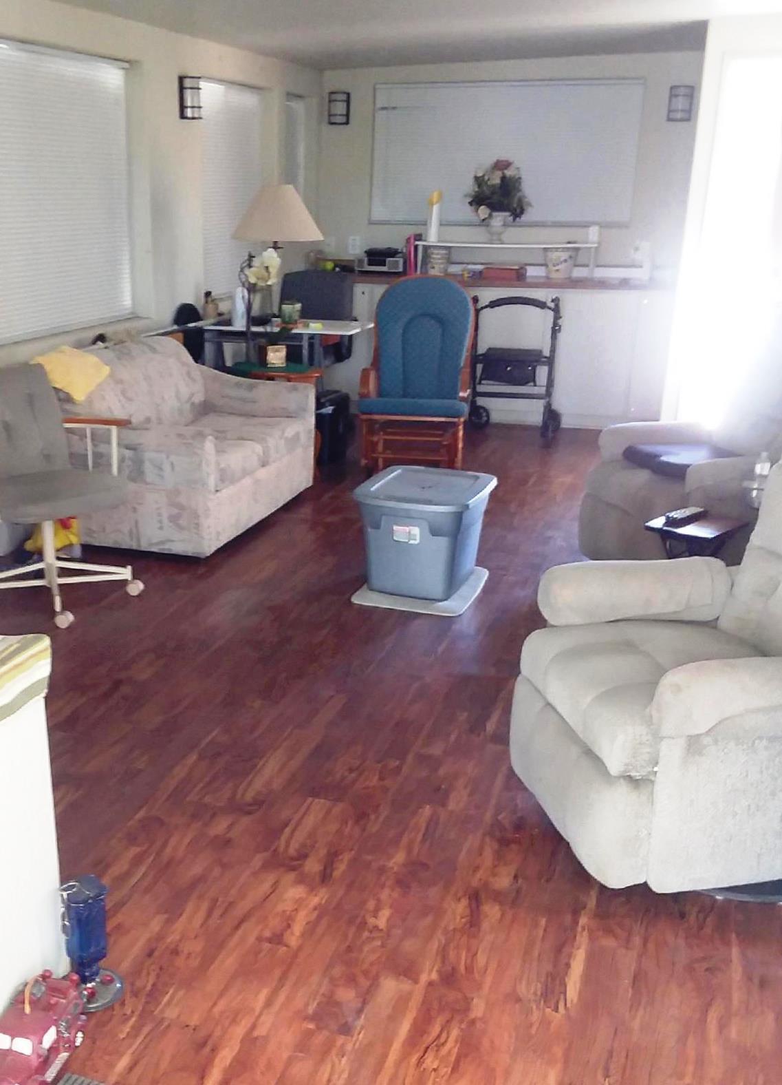 84136 Ave 44, Unit 593 Indio, CA 92203 - Photo 9 of 31 a living room with furniture and a wooden floor