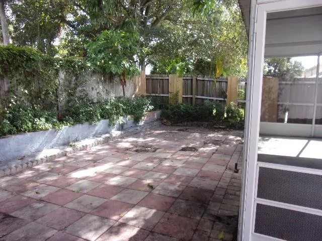 a view of backyard with green space