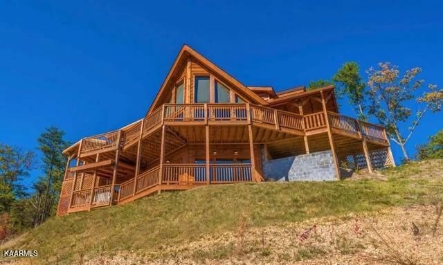 2456 Hackberry Drive Sevierville, TN 37862 - Photo 24 of 25 a view of a house with a yard