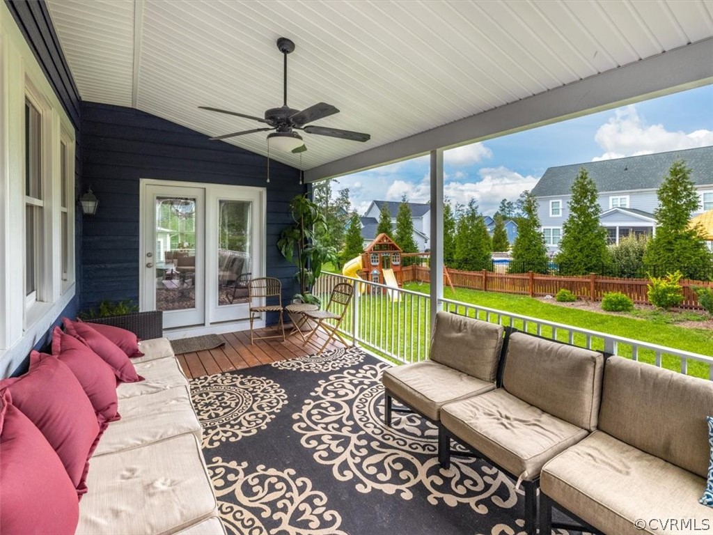 16424 Lambourne Road Midlothian, VA 23112 - Photo 29 of 32 a balcony with furniture and a floor to ceiling window