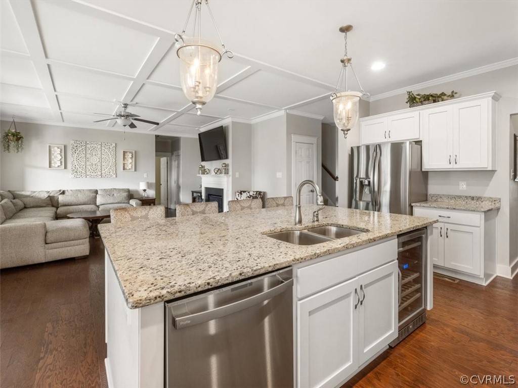 16424 Lambourne Road Midlothian, VA 23112 - Photo 9 of 32 a kitchen with stainless steel appliances granite countertop a sink and cabinets