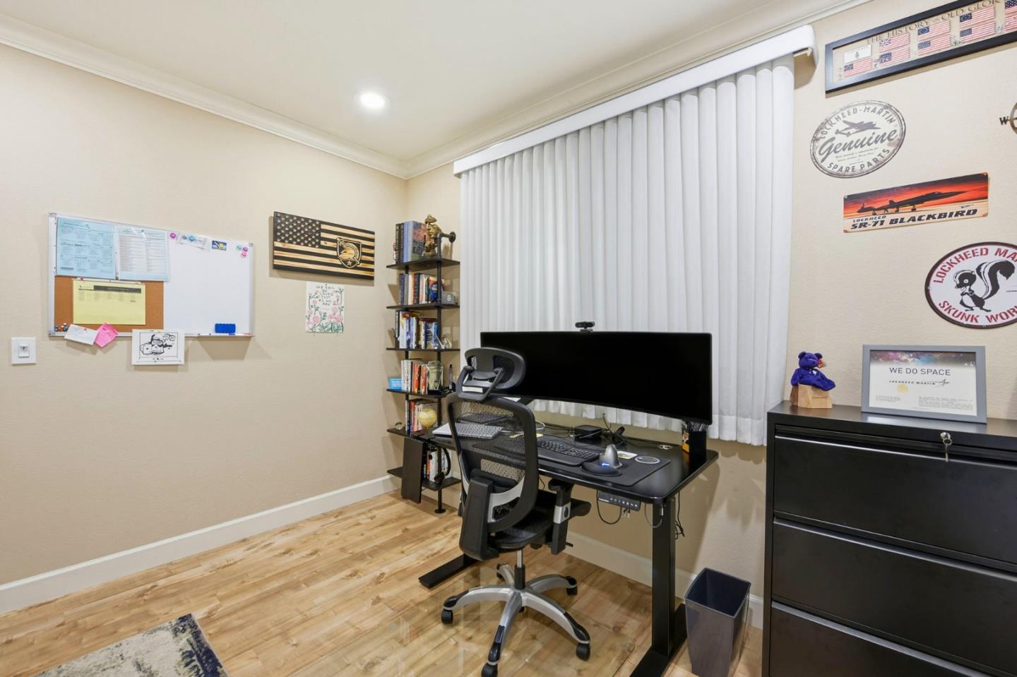 56 Regency Place Hayward, CA 94544 - Photo 18 of 43 a view of a workspace with furniture and a window