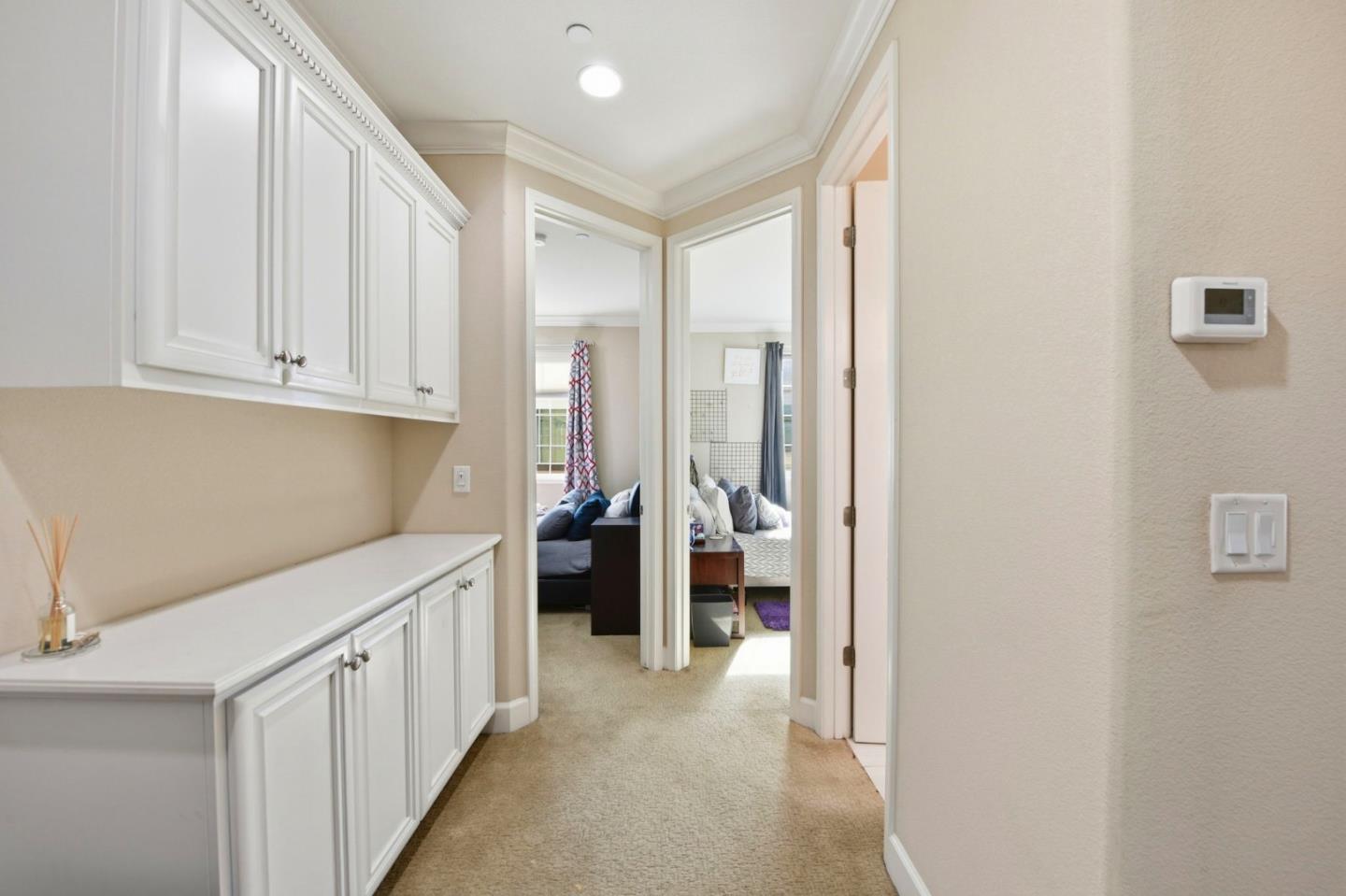 56 Regency Place Hayward, CA 94544 - Photo 19 of 43 a view of a kitchen with white cabinets