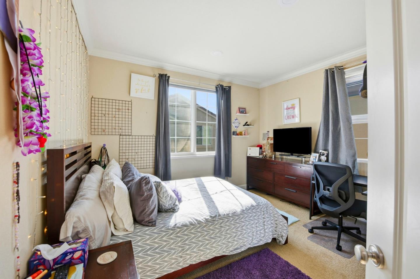 56 Regency Place Hayward, CA 94544 - Photo 23 of 43 a bedroom with a bed and flat screen tv