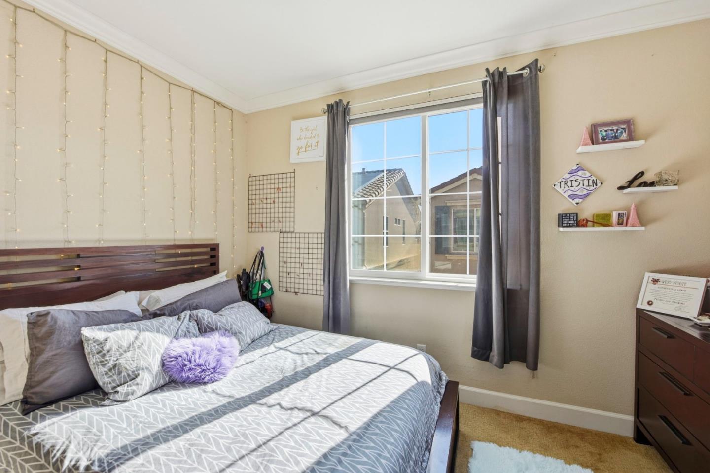 56 Regency Place Hayward, CA 94544 - Photo 24 of 43 a bedroom with a bed and a window