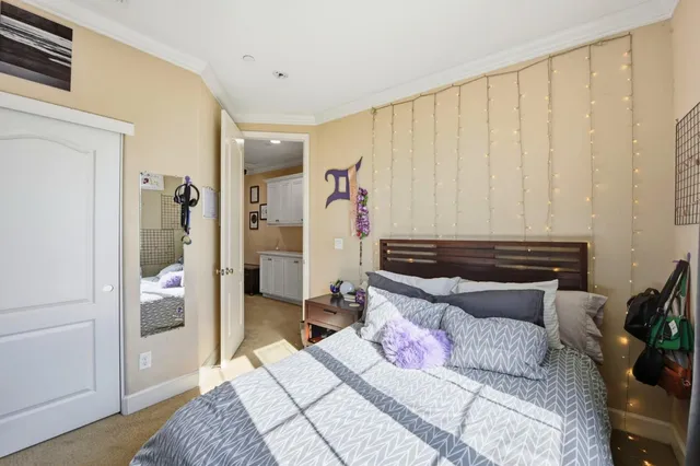 a bedroom with a bed and furniture