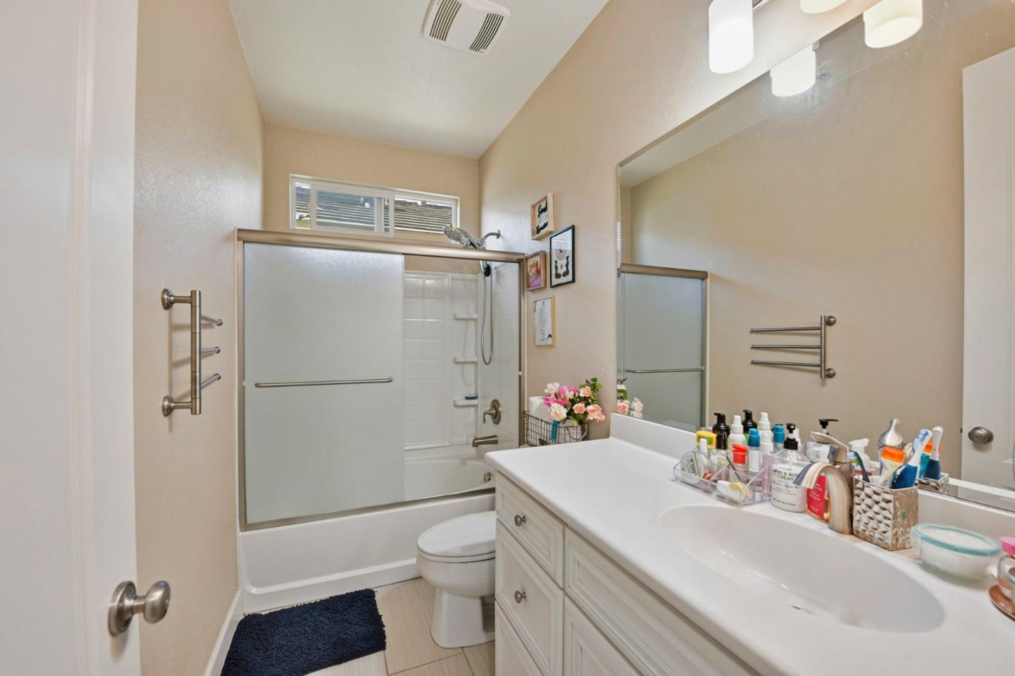 56 Regency Place Hayward, CA 94544 - Photo 29 of 43 a bathroom with a sink a toilet and shower
