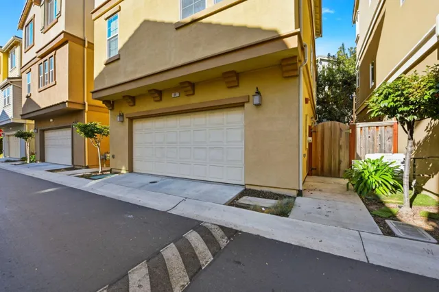 a front view of a house with a garage