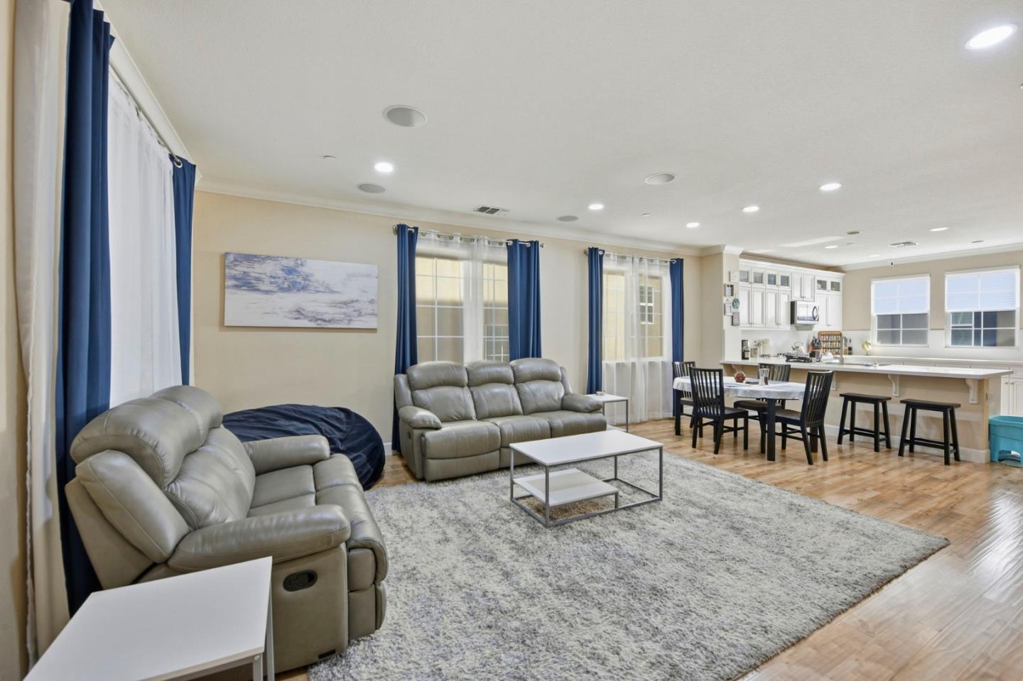 56 Regency Place Hayward, CA 94544 - Photo 7 of 43 a living room with furniture and a dining table