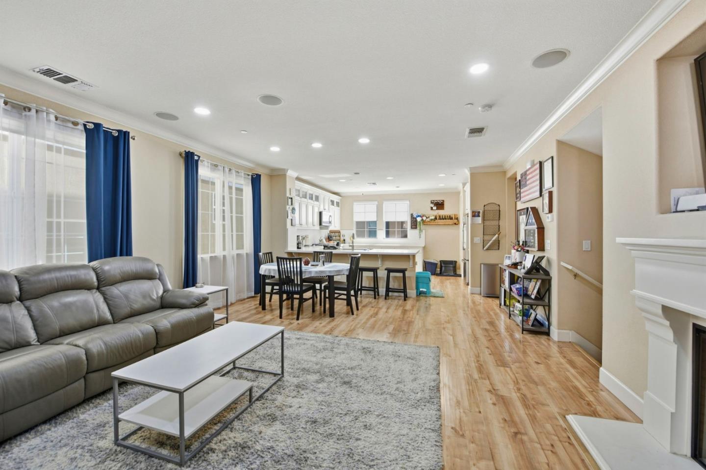 56 Regency Place Hayward, CA 94544 - Photo 8 of 43 a living room with furniture and a wooden floor