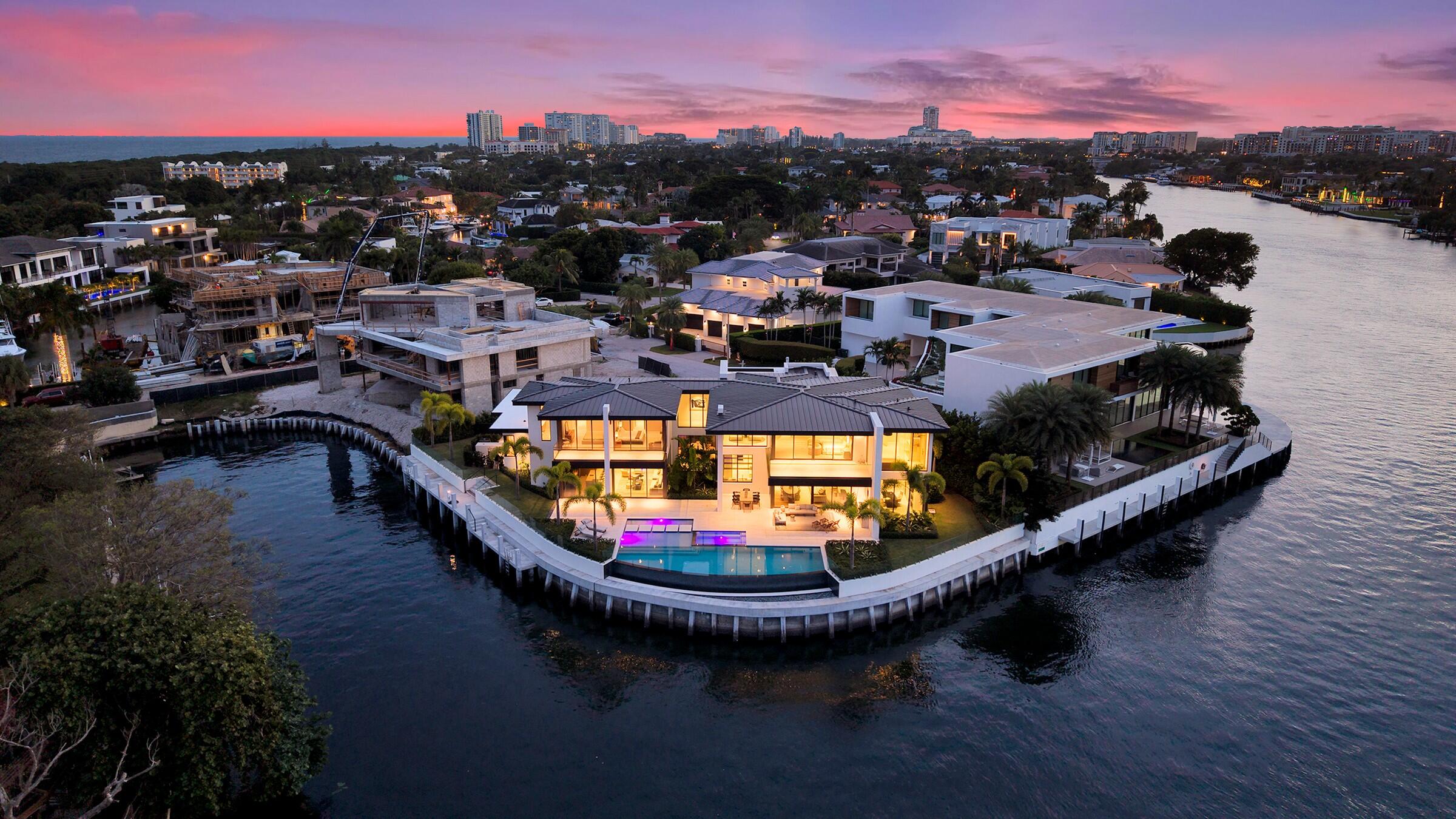 a view of a swimming pool with lounge chair