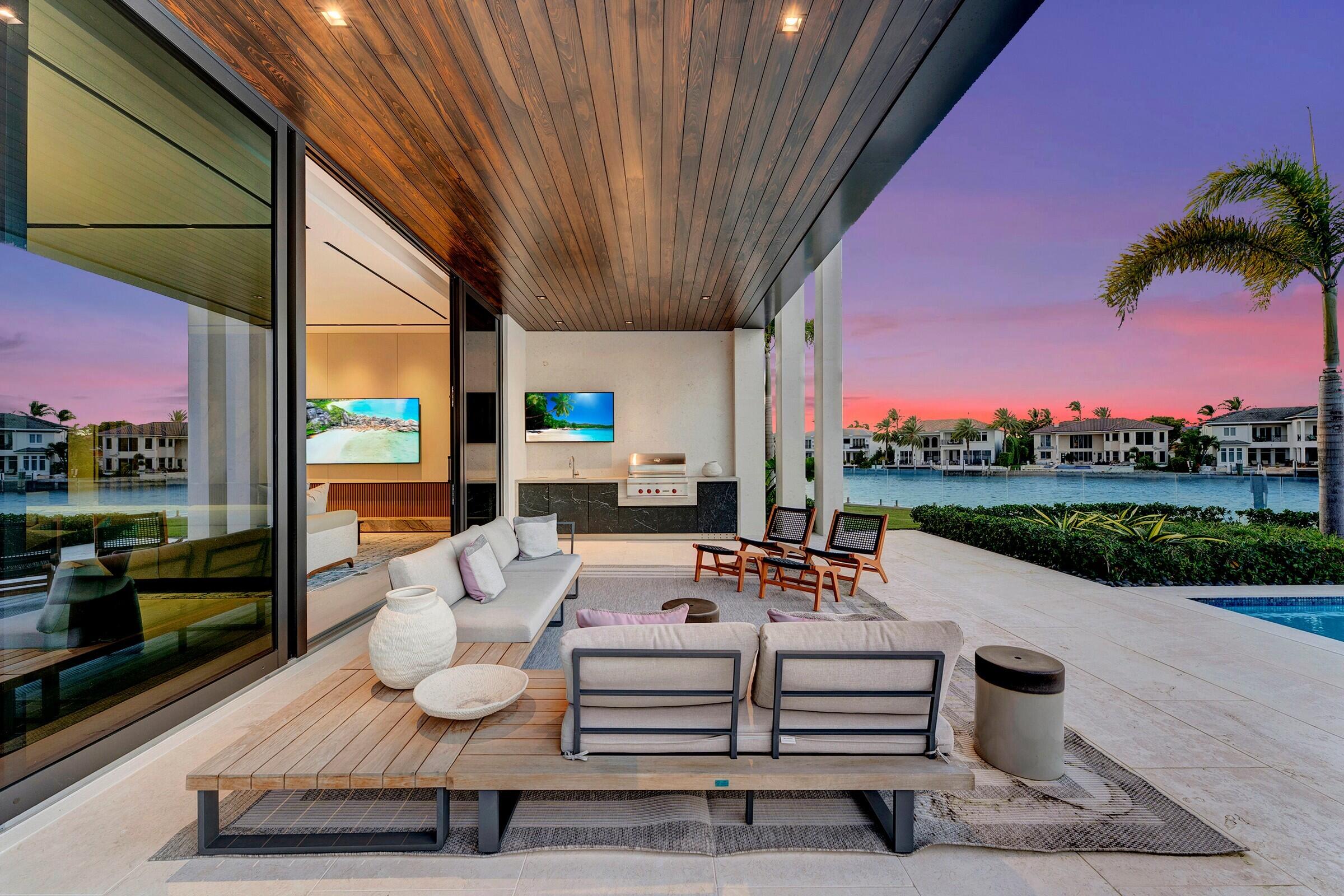 829 Orchid Drive Boca Raton, FL 33432 - Photo 15 of 102 a outdoor space with patio the couches and pool