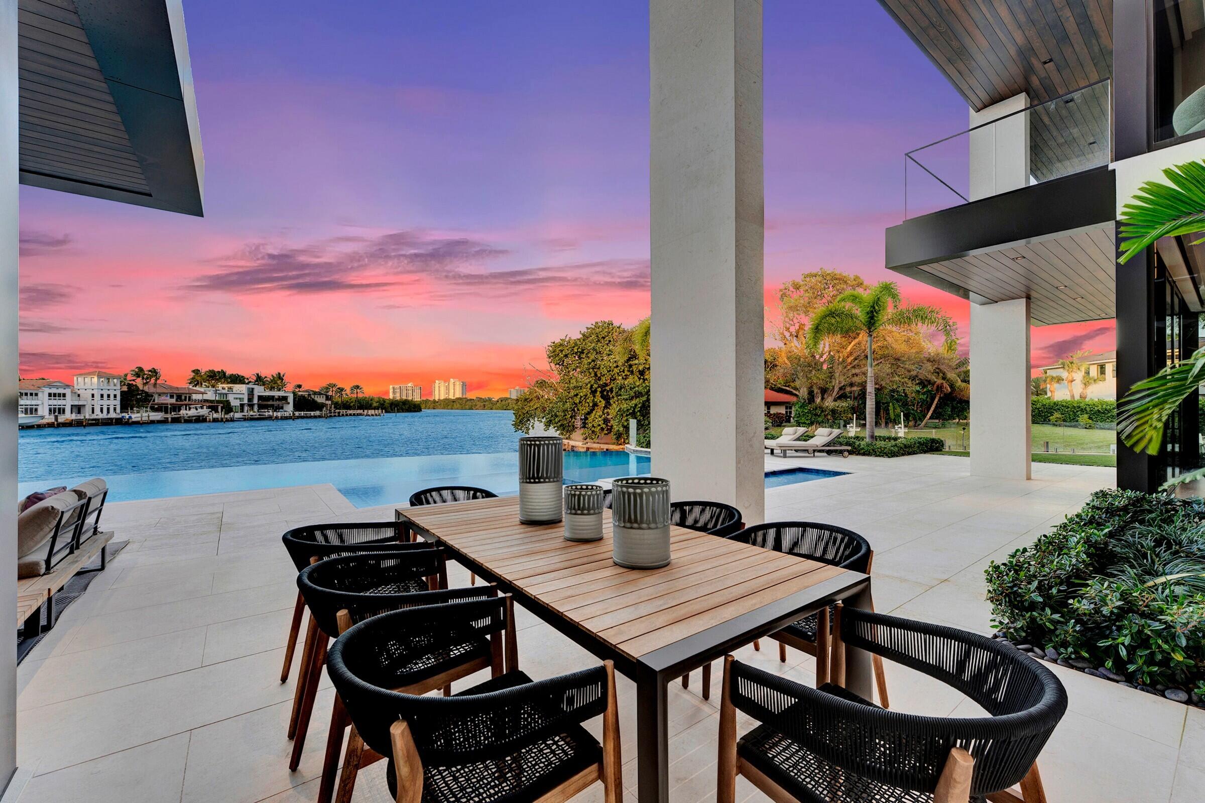 829 Orchid Drive Boca Raton, FL 33432 - Photo 18 of 102 a view of a terrace with furniture and a potted plant