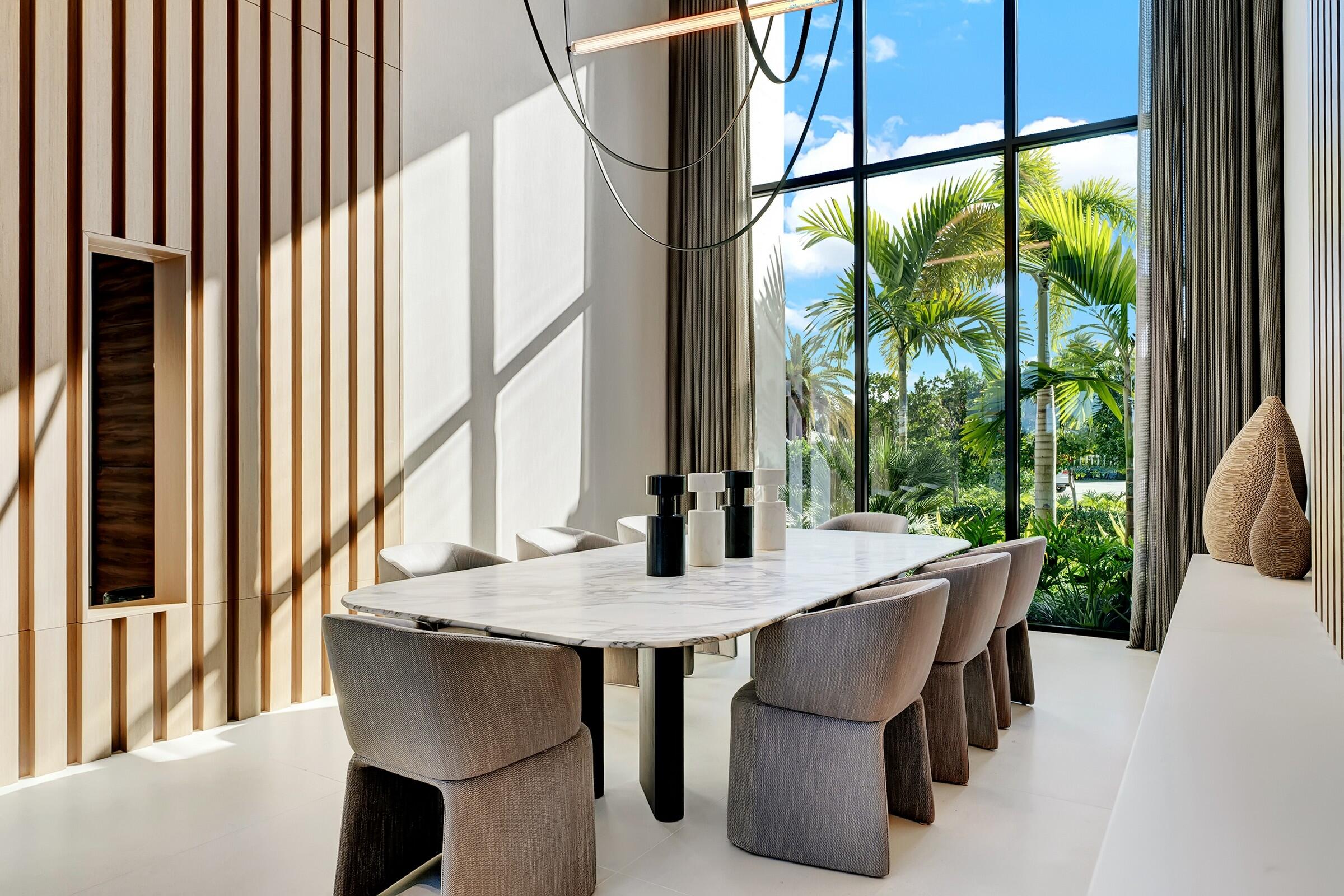 829 Orchid Drive Boca Raton, FL 33432 - Photo 37 of 102 a dining room with furniture window and wooden floor