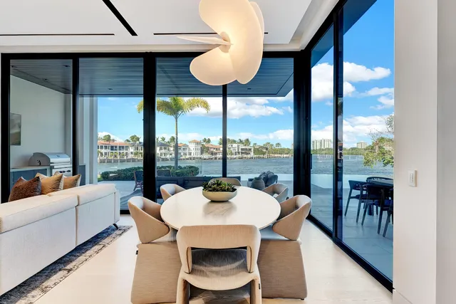 an aerial view of a house with a ocean view