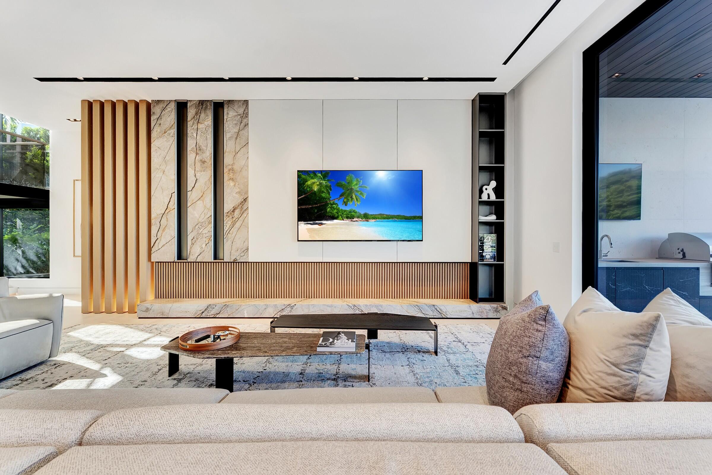 829 Orchid Drive Boca Raton, FL 33432 - Photo 53 of 102 a living room with furniture and a flat screen tv