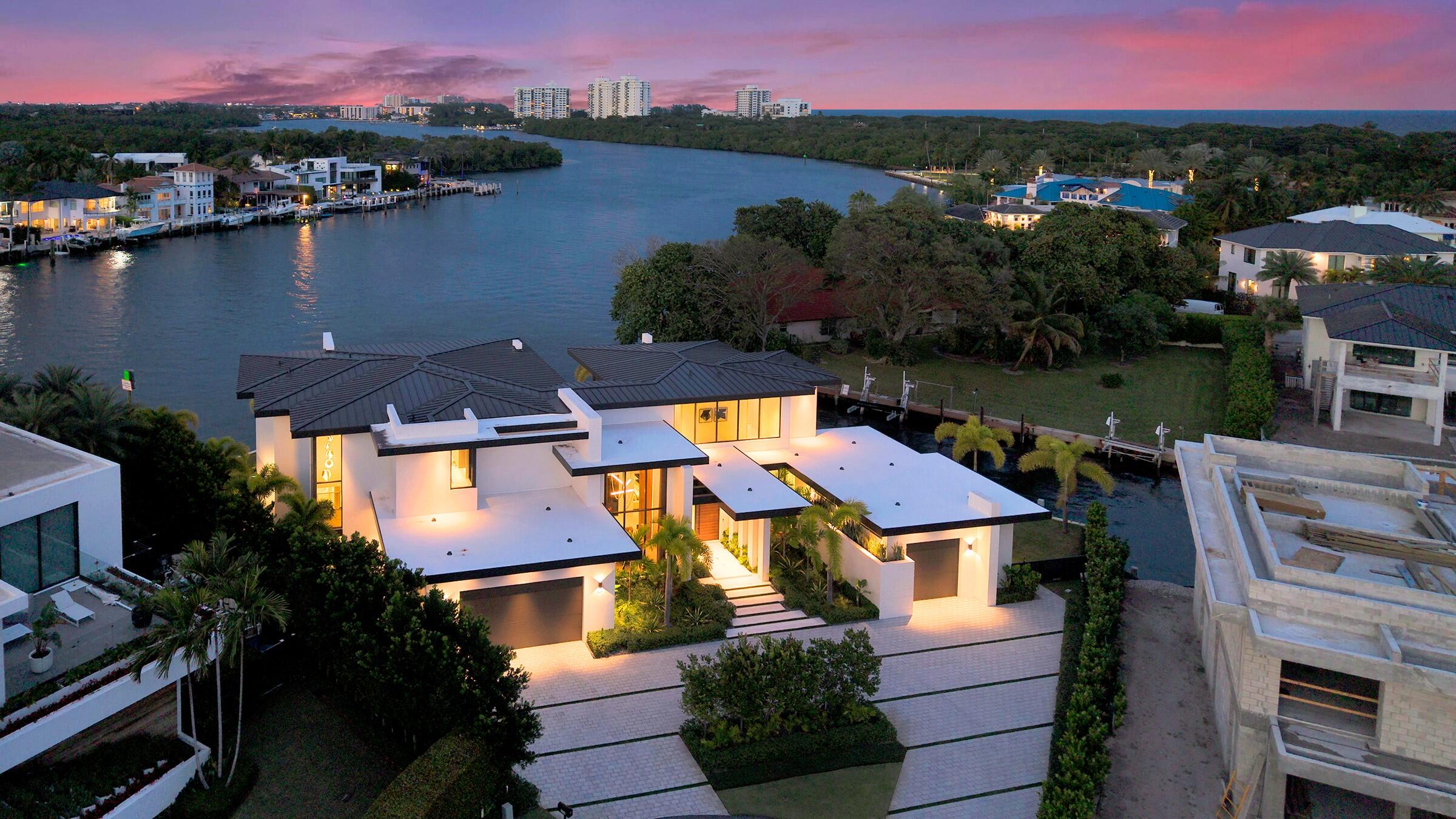 829 Orchid Drive Boca Raton, FL 33432 - Photo 7 of 102 an aerial view of residential houses with outdoor space and lake view