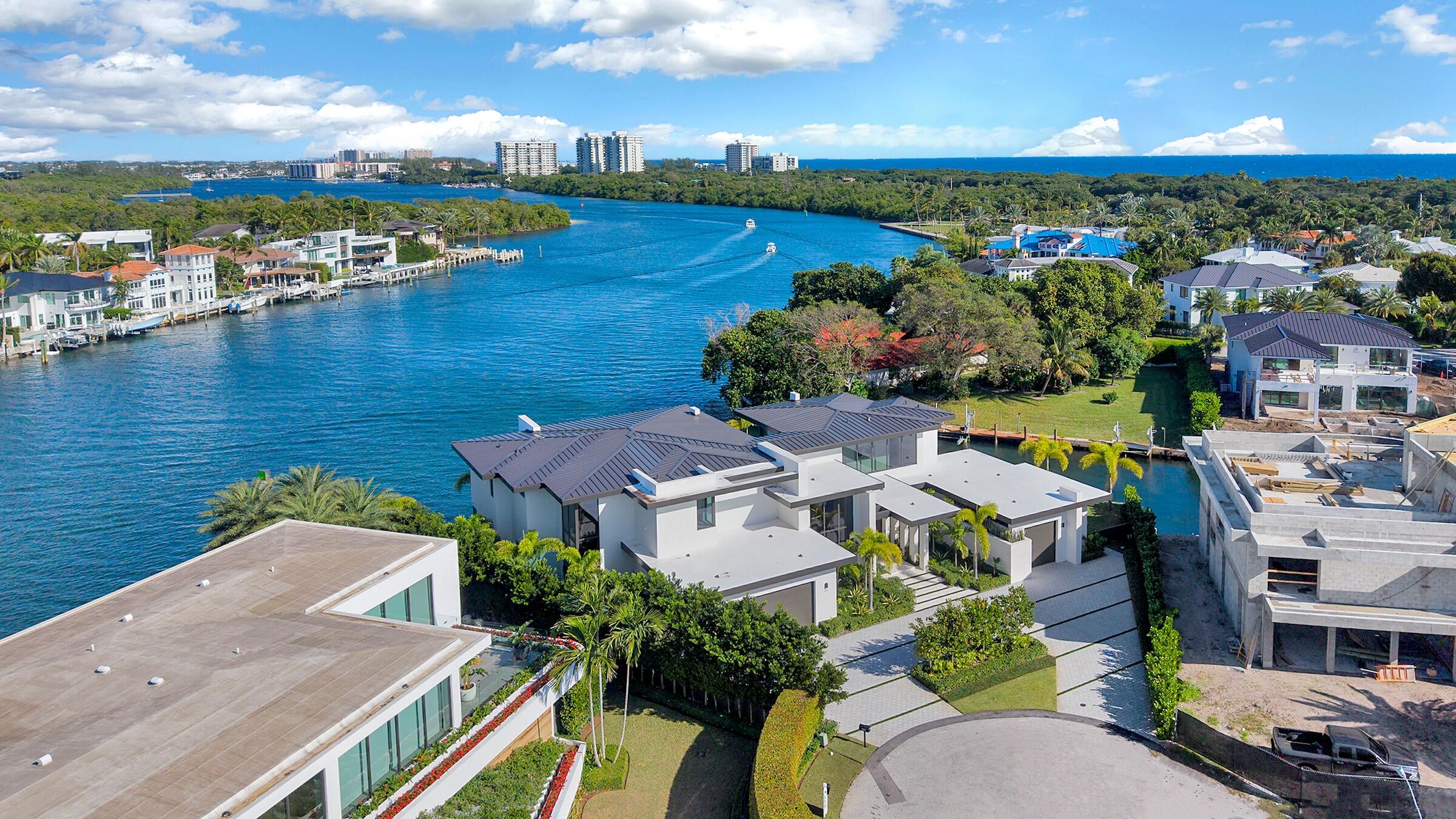 829 Orchid Drive Boca Raton, FL 33432 - Photo 82 of 102 an aerial view of residential houses with outdoor space and ocean view