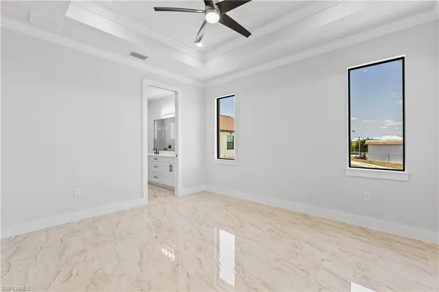 a bathroom with a double vanity sink mirror double and shower