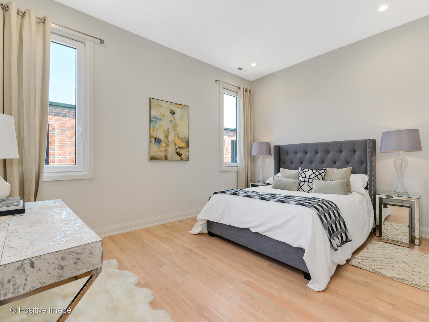 6915 North Western Avenue, Unit 2 Chicago, IL 60645 - Photo 18 of 25 a bedroom with a large bed and a window