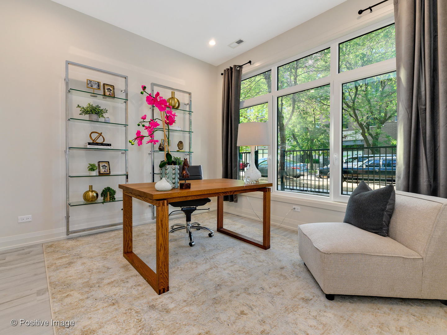 6915 North Western Avenue, Unit 2 Chicago, IL 60645 - Photo 21 of 25 a living room with furniture and a floor to ceiling window