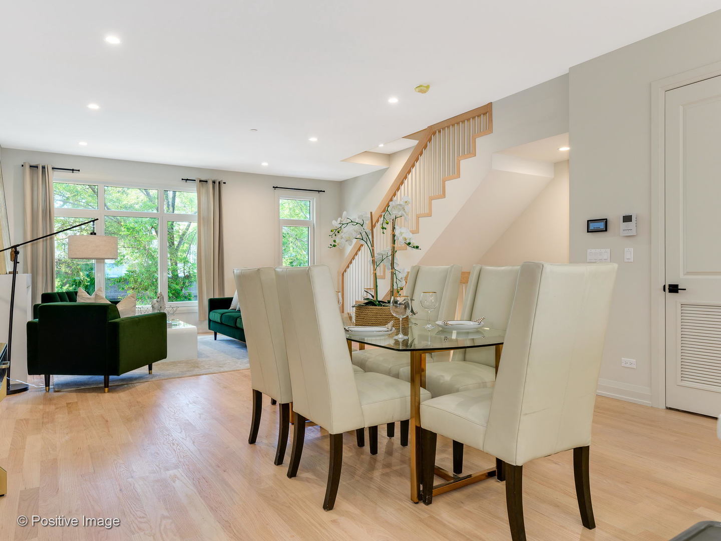 6915 North Western Avenue, Unit 2 Chicago, IL 60645 - Photo 5 of 25 a view of a dining room with furniture window and wooden floor