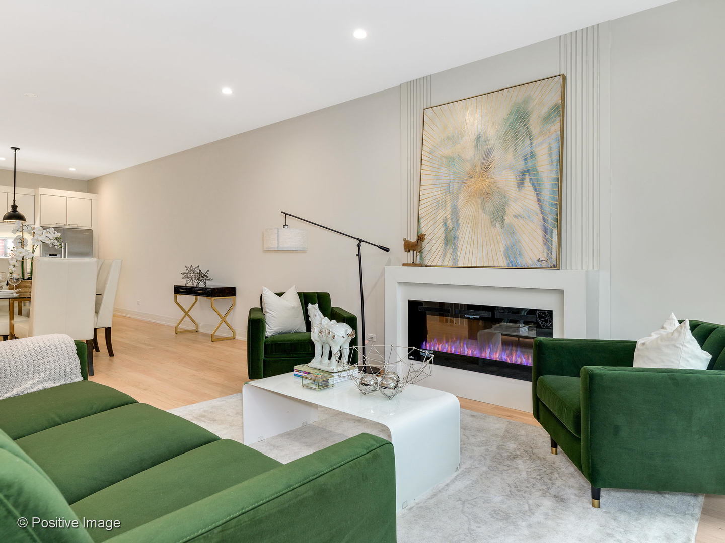 6915 North Western Avenue, Unit 2 Chicago, IL 60645 - Photo 7 of 25 a living room with furniture and a fireplace