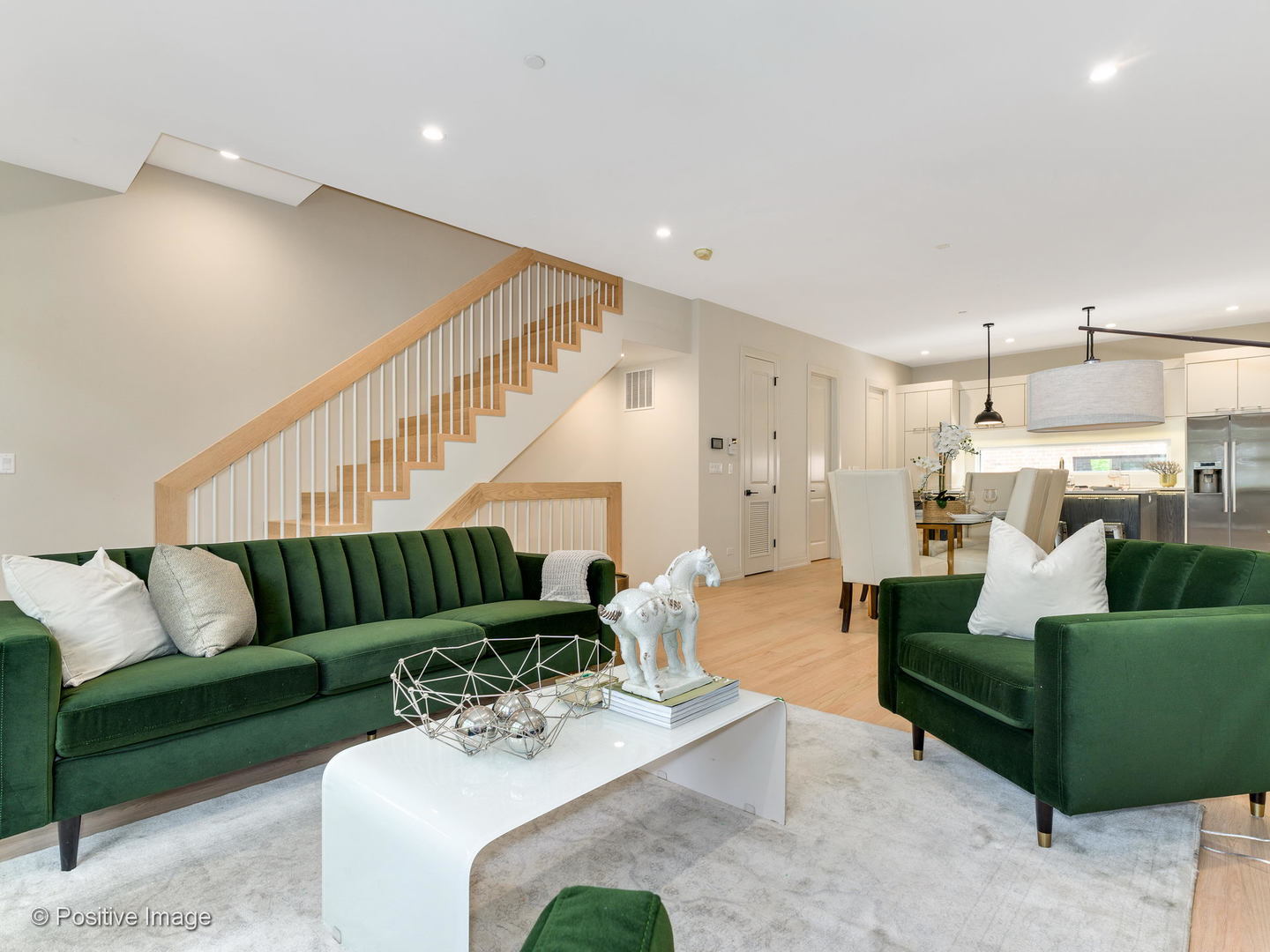 6915 North Western Avenue, Unit 2 Chicago, IL 60645 - Photo 9 of 25 a living room with furniture and a wooden floor