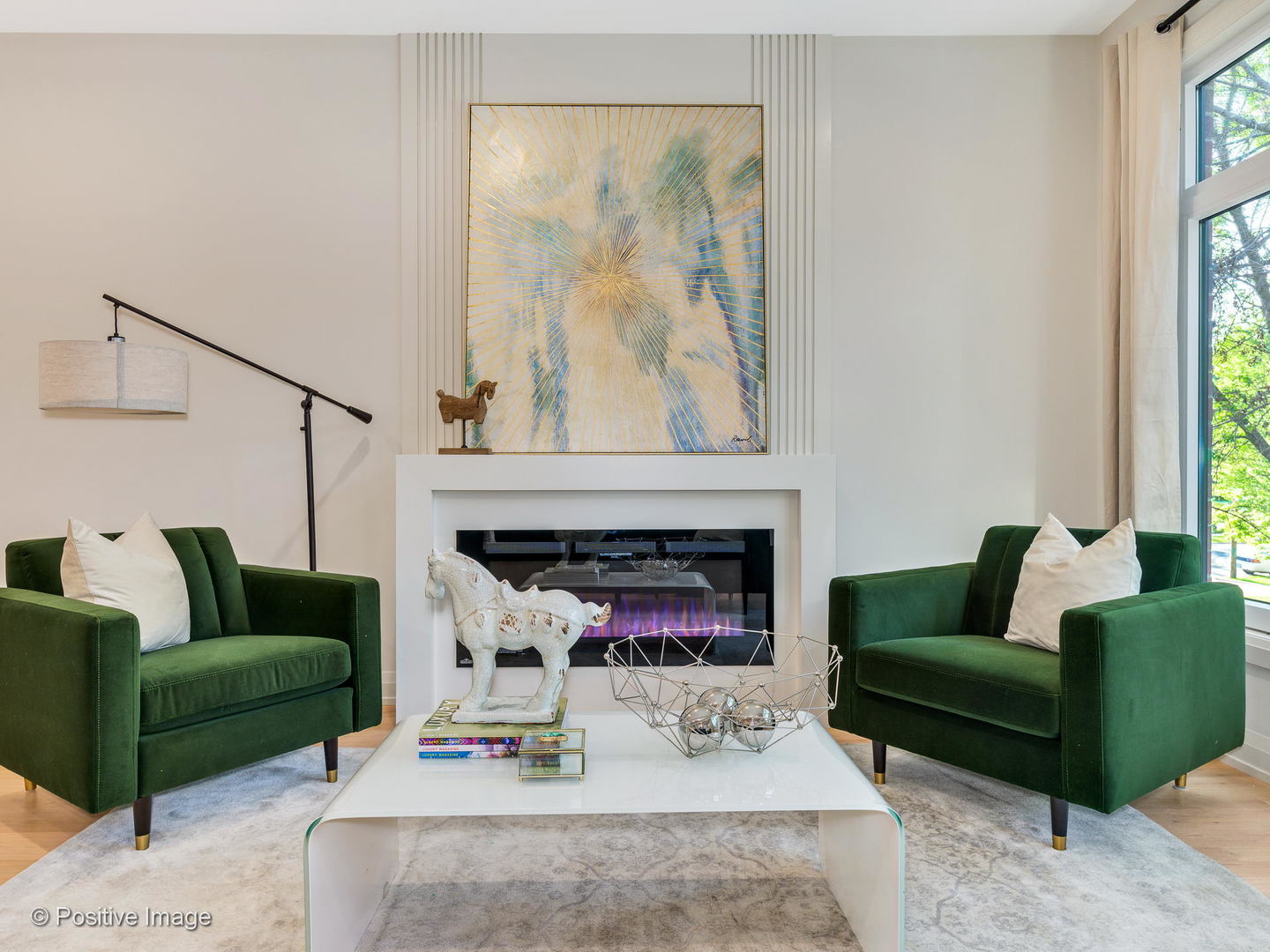 6915 North Western Avenue, Unit 2 Chicago, IL 60645 - Photo 10 of 25 a living room with furniture and a fireplace