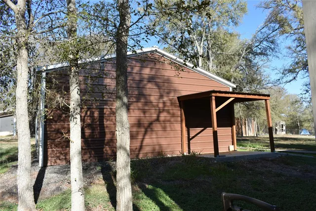 a front view of a house with yard