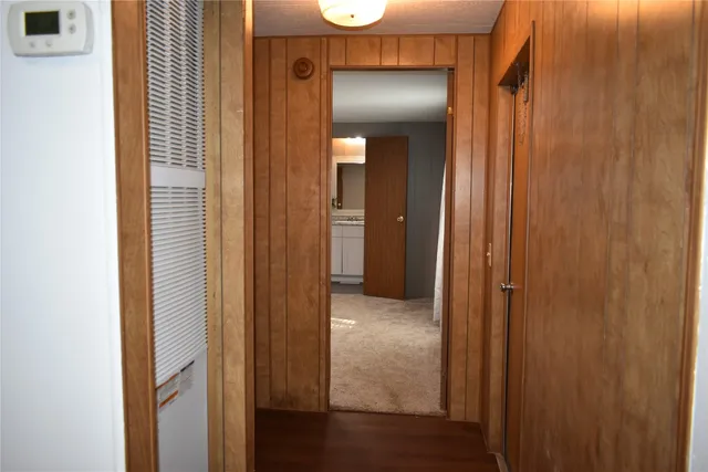 a view of a elevator and an empty room