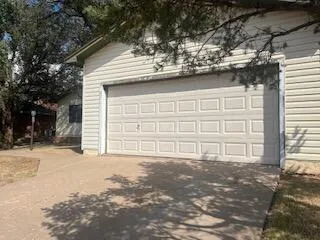 a view of a house with a large space
