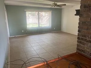 an empty room with a bathroom