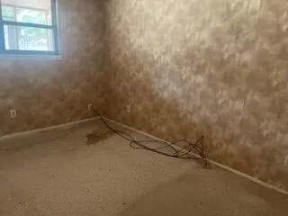 a view of room with window and floor