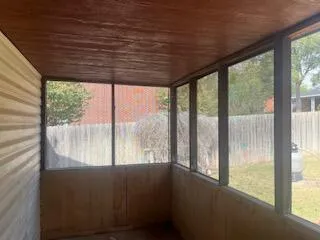 a view of yard with swimming pool and trees