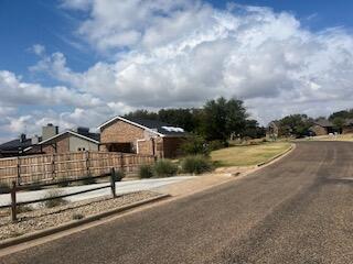 60 East Canyon View Drive Ransom Canyon, TX 79366 - Photo 27 of 32 a view of a large house with a big yard and large trees